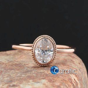 Engagement Ring Oval Cut Bezel Milgrain Setting